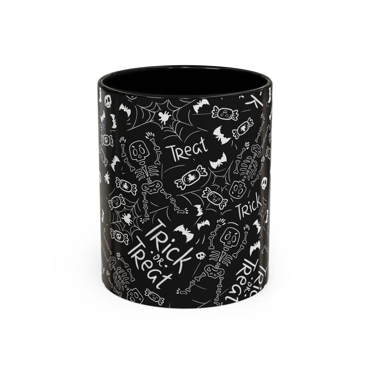 A black ceramic mug with a white 'Trick or Treat' Halloween pattern featuring chalkboard-style drawings of skeletons, bats, candy corn, and spiderwebs.