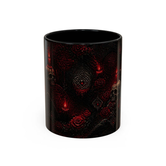 A black ceramic mug featuring a gothic design with red roses, skulls, candles, and occult symbols, shown on a plain white background.