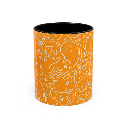 An orange ceramic mug with a black interior, decorated with a white doodle pattern of ghosts, pumpkins, and 'Boo' signs, shown on a plain white background.